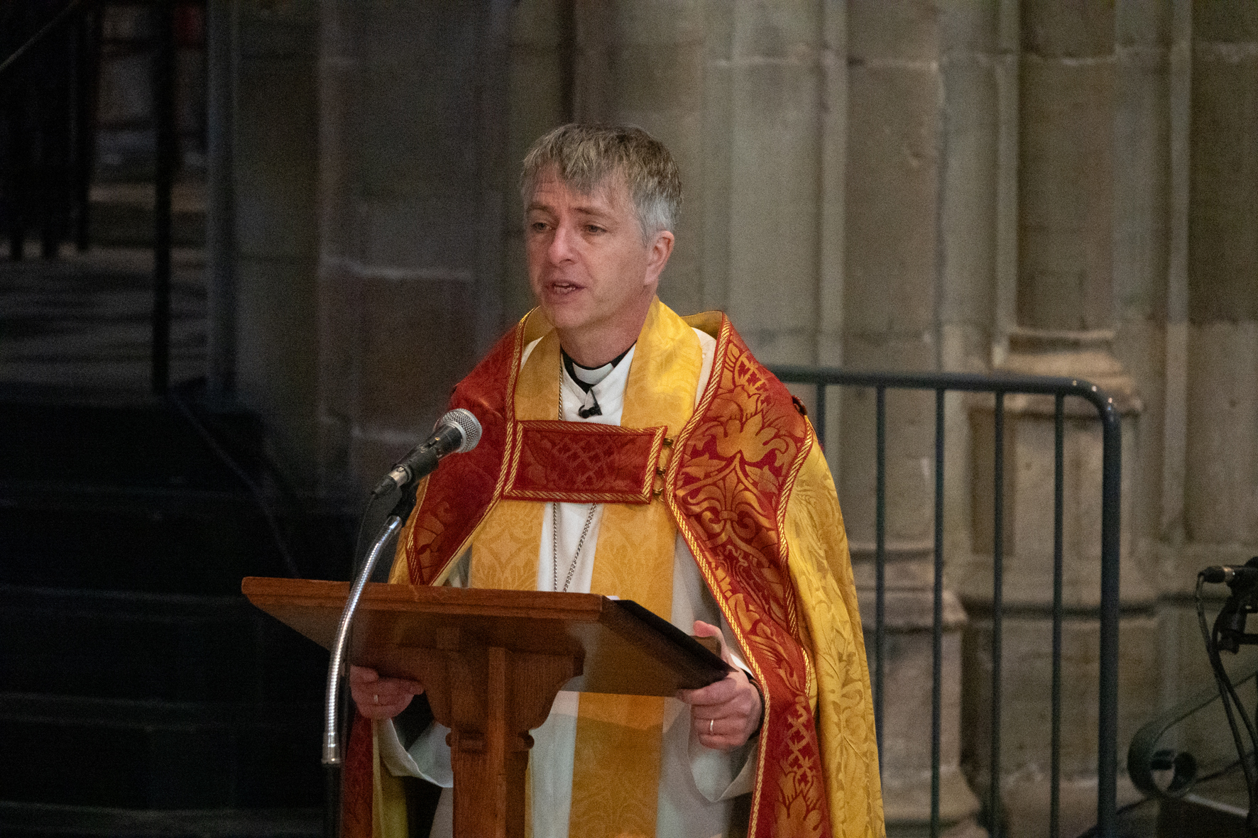 Bishop Hugh standing at the lectern to preach