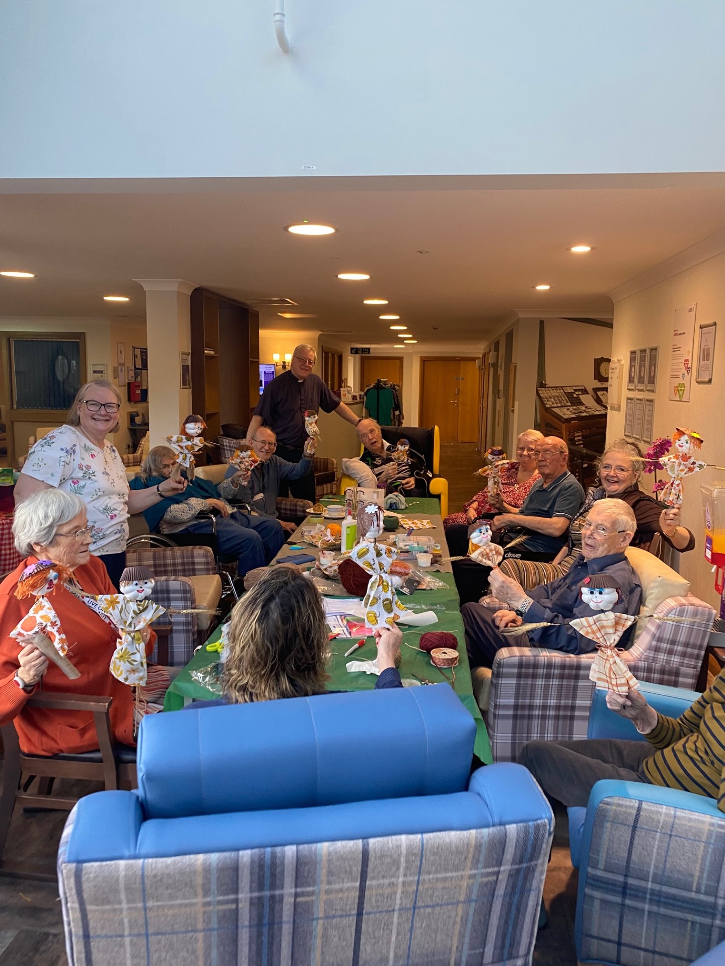 A group of residents at Perry Wood care home with members of St Matthews Church