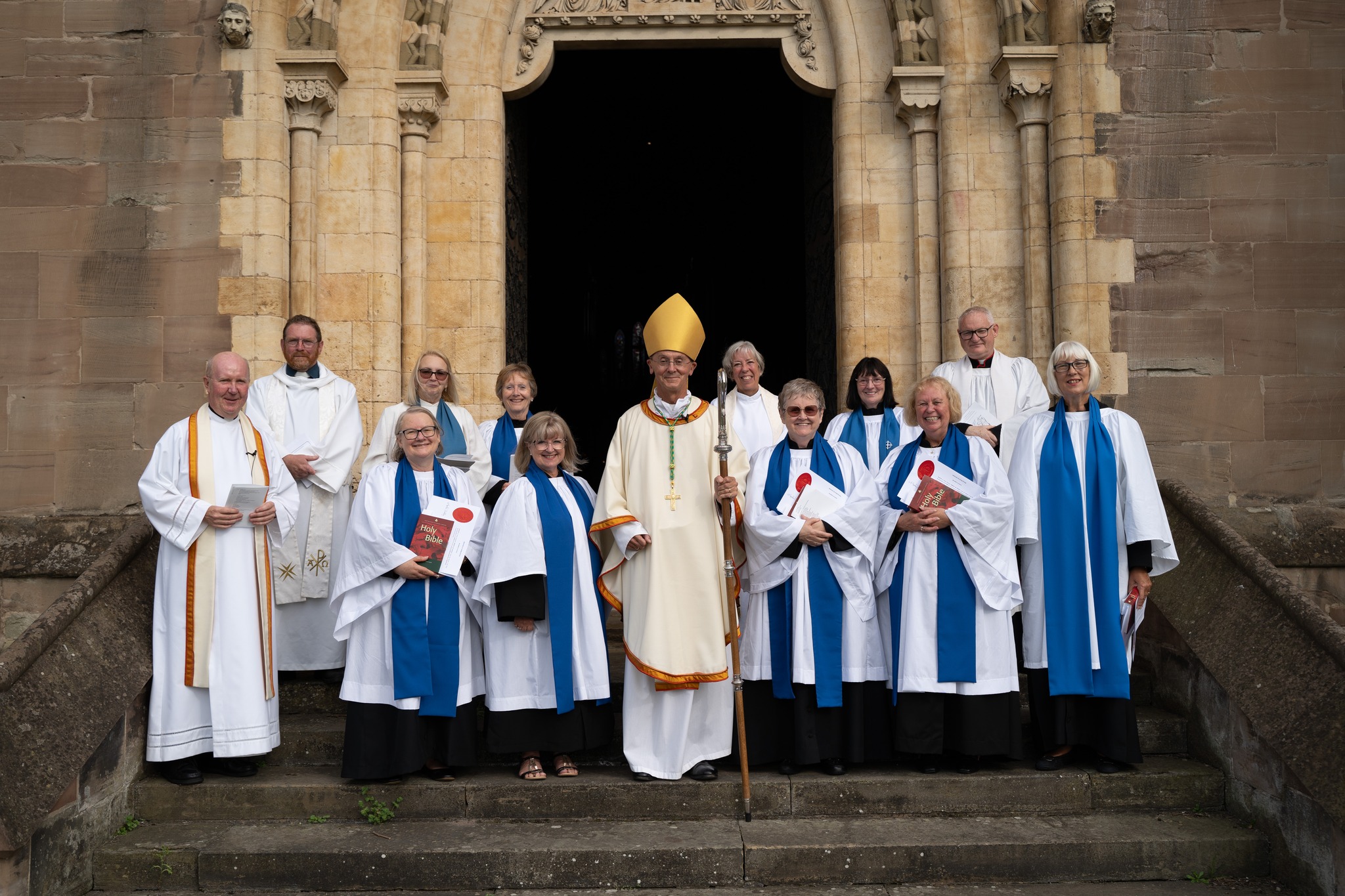 Newly licensed Readers outside the cathedral with Bishop John