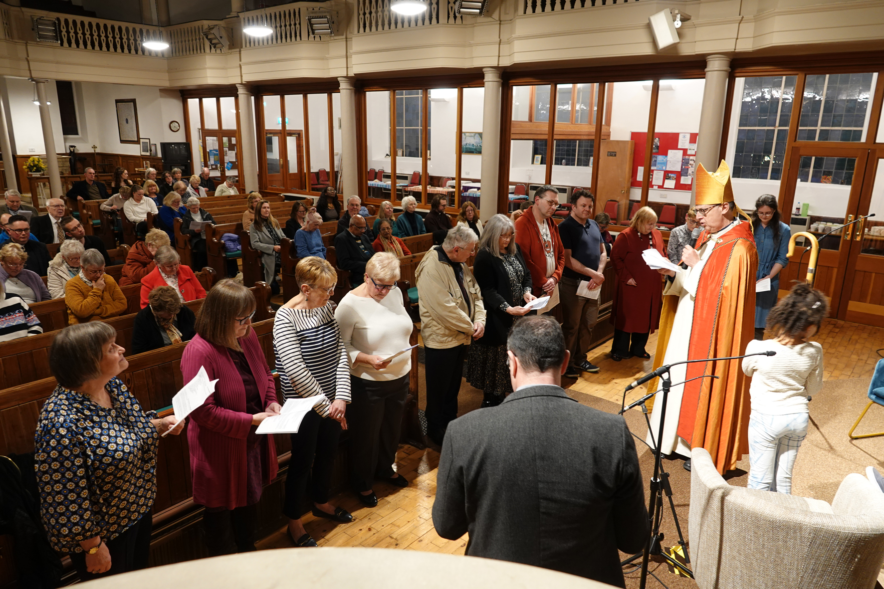 Bishop Martin speaking with the ALMs ahead of presenting them with their certificates