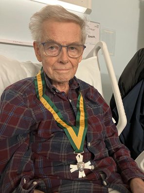Paul Tongue in hospital wearing the Wulfstan Cross