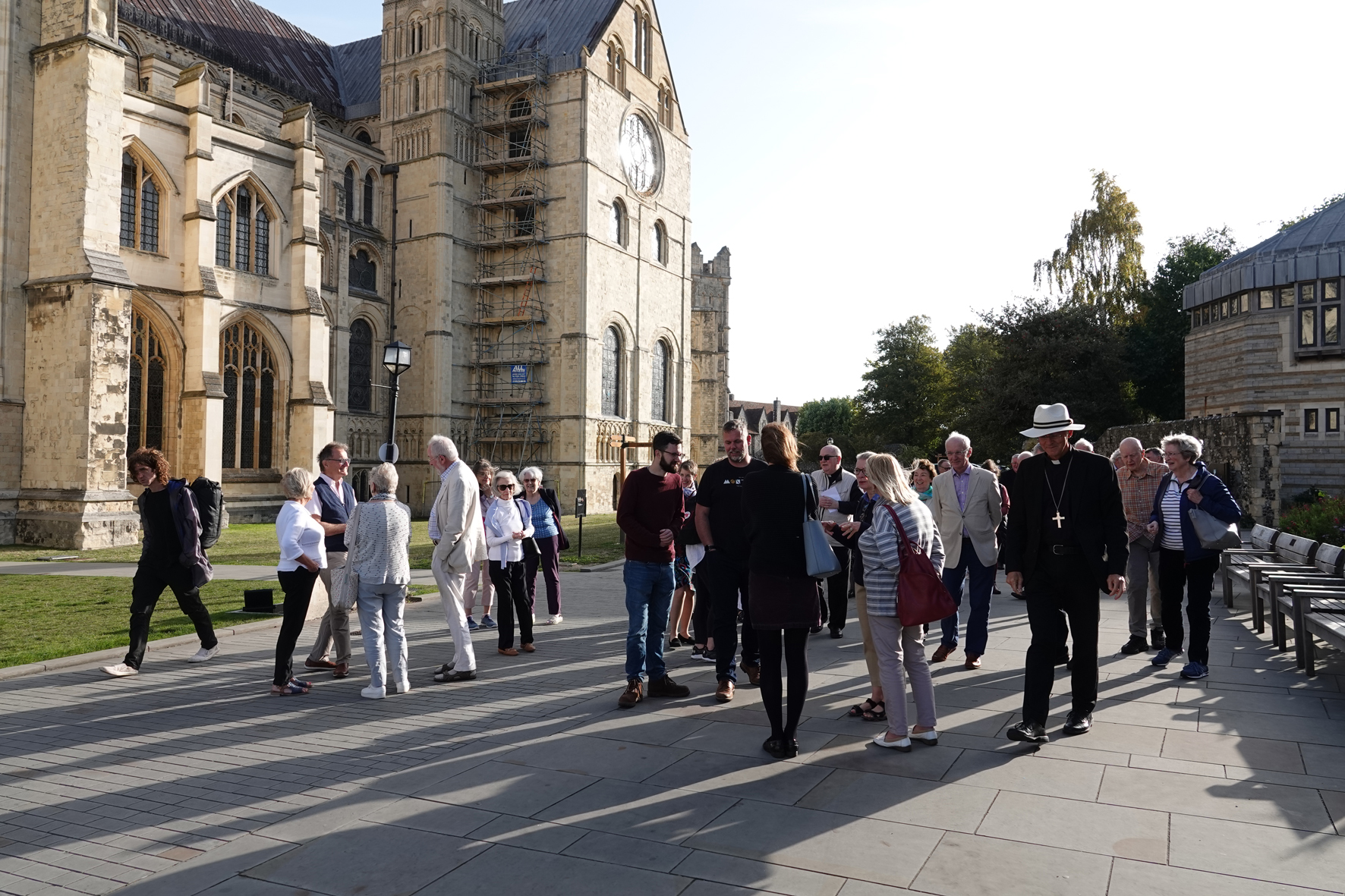 Pilgrims in the sunshine outside Canterbury Cathedral