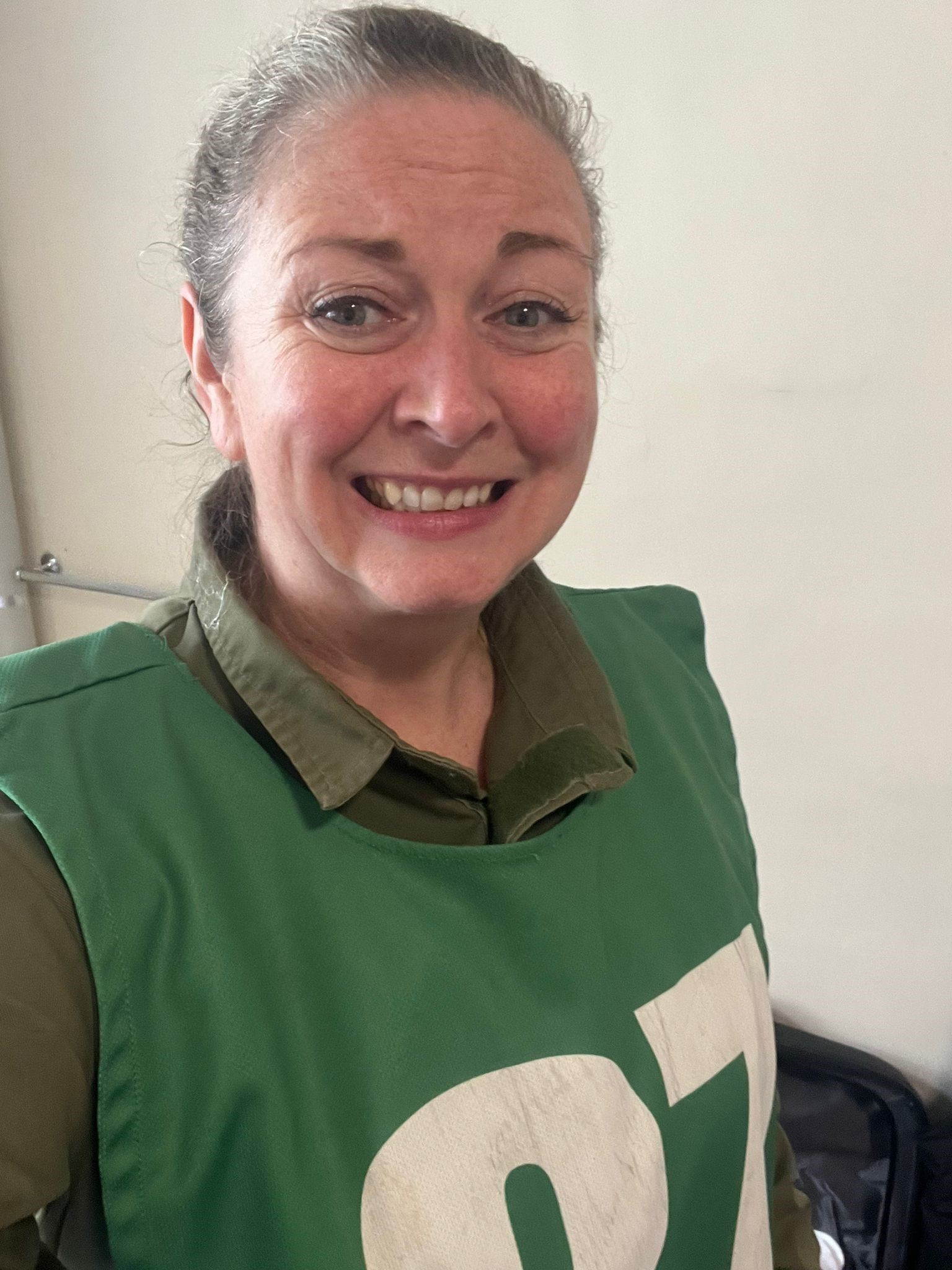 Head and shoulders photo of claire with a tabard featuring her number for the Army selection weekend