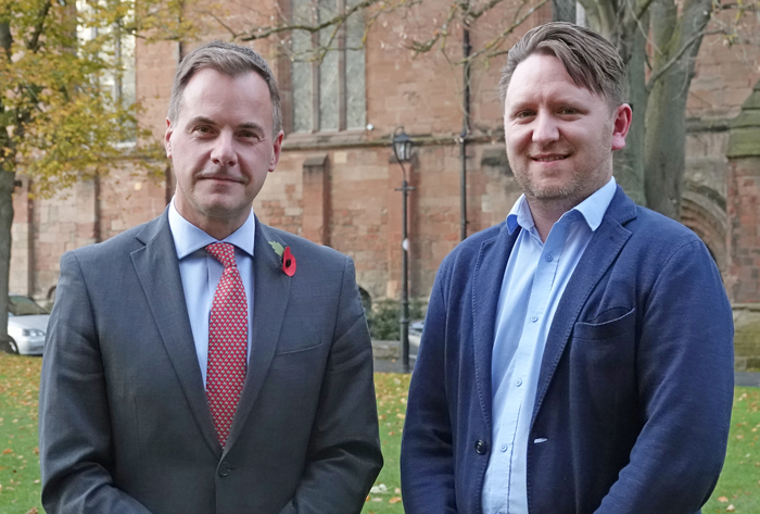 Gareth Doodes standing with Mark Carter