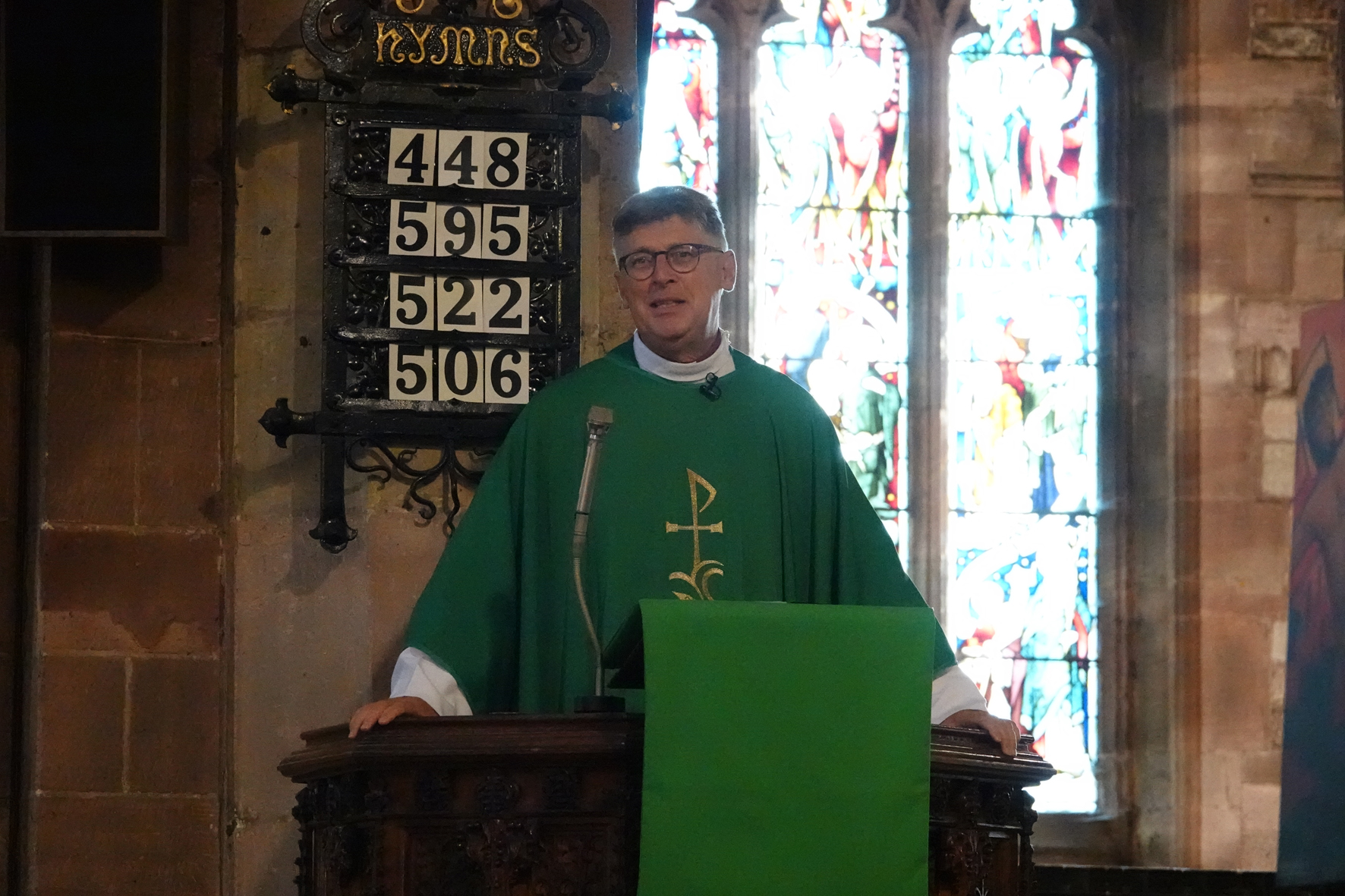 Bishop Martin standing in the pulpit at St John's Church in Halesowen