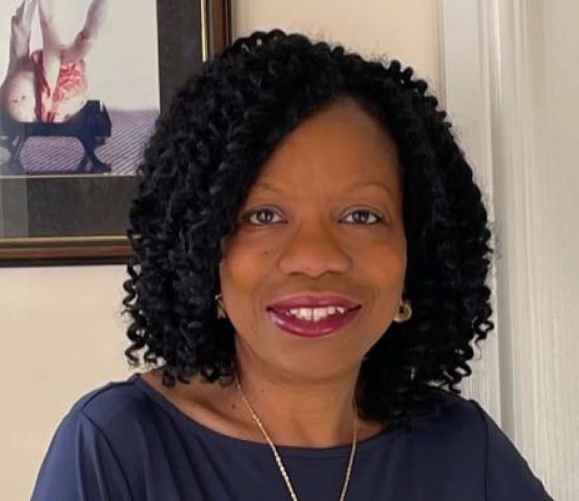Head and shoulders shot of Dawn Braithwaite smiling into the camera