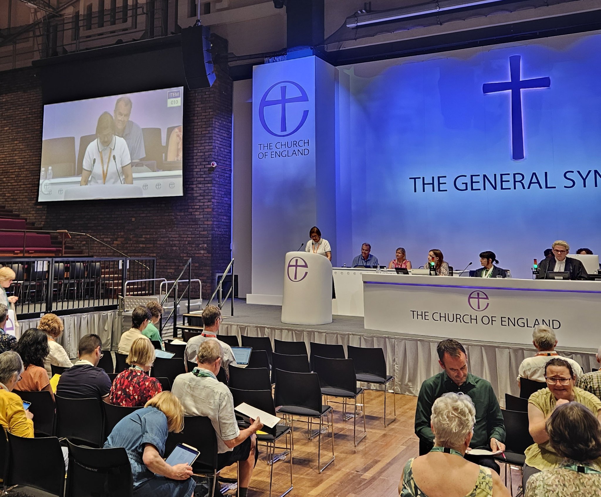 Wide shot of the general synod chamber with Kashmir presenting the diocesan synod motion