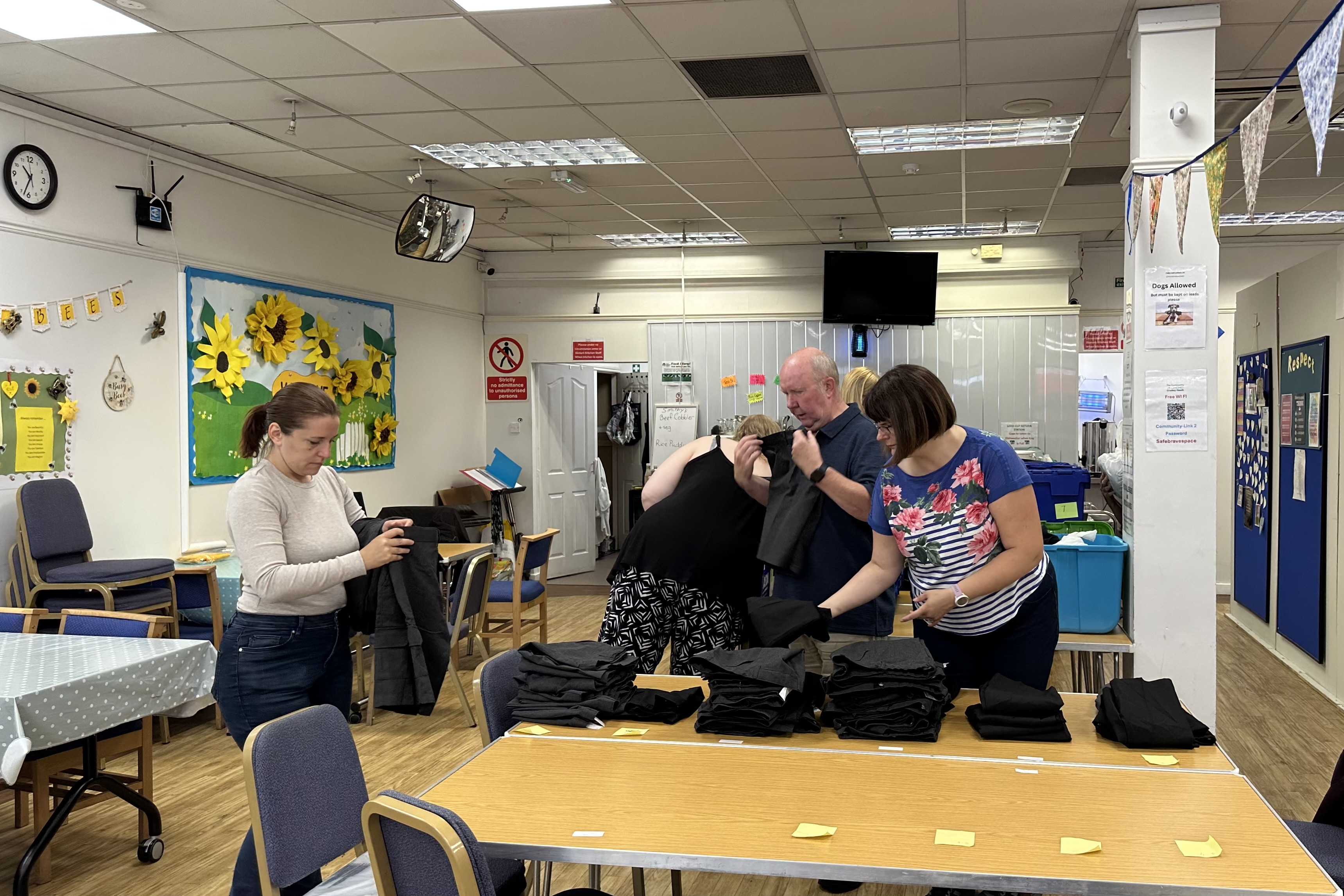 Volunteers sort uniform