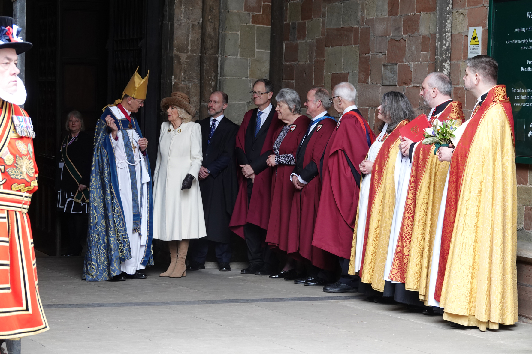 The Queen is greeted by Bishop John as she arrives at the Cathedral