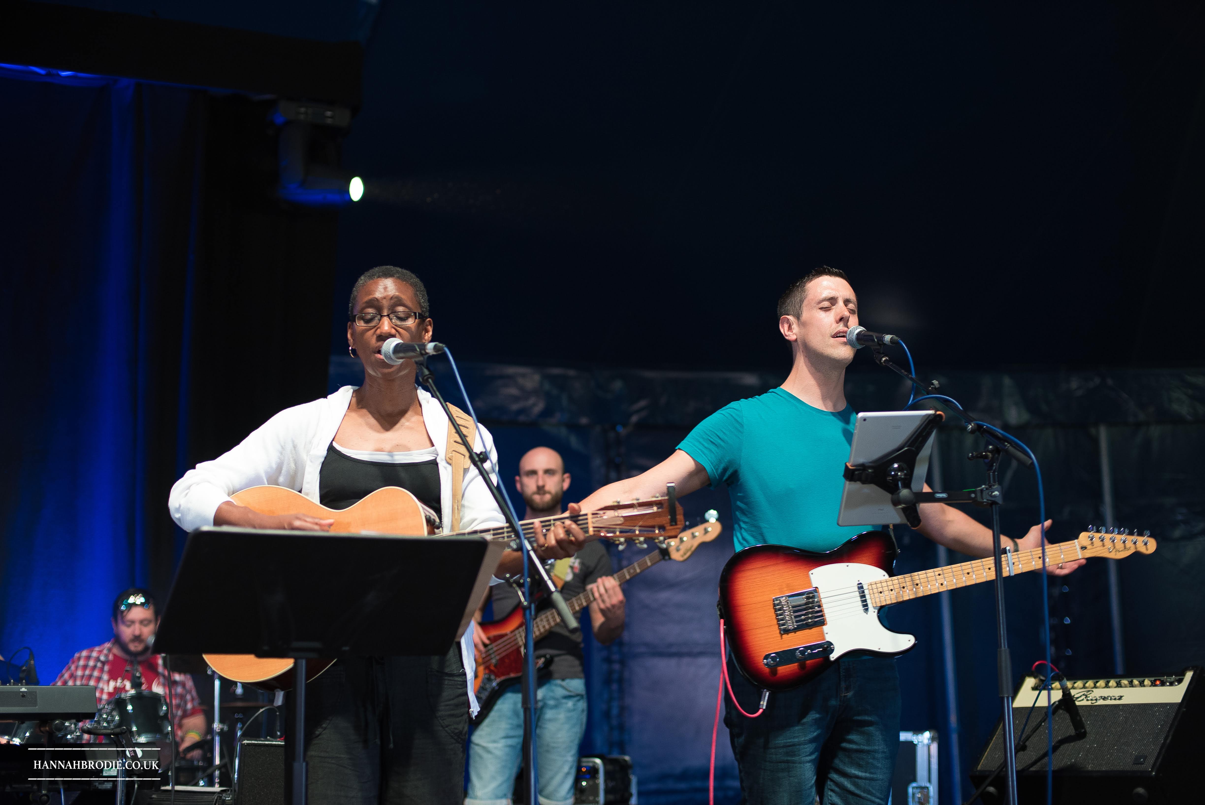 Dave Shaw alongside another worship leader playing guitar at Walsingham Pilgrimage