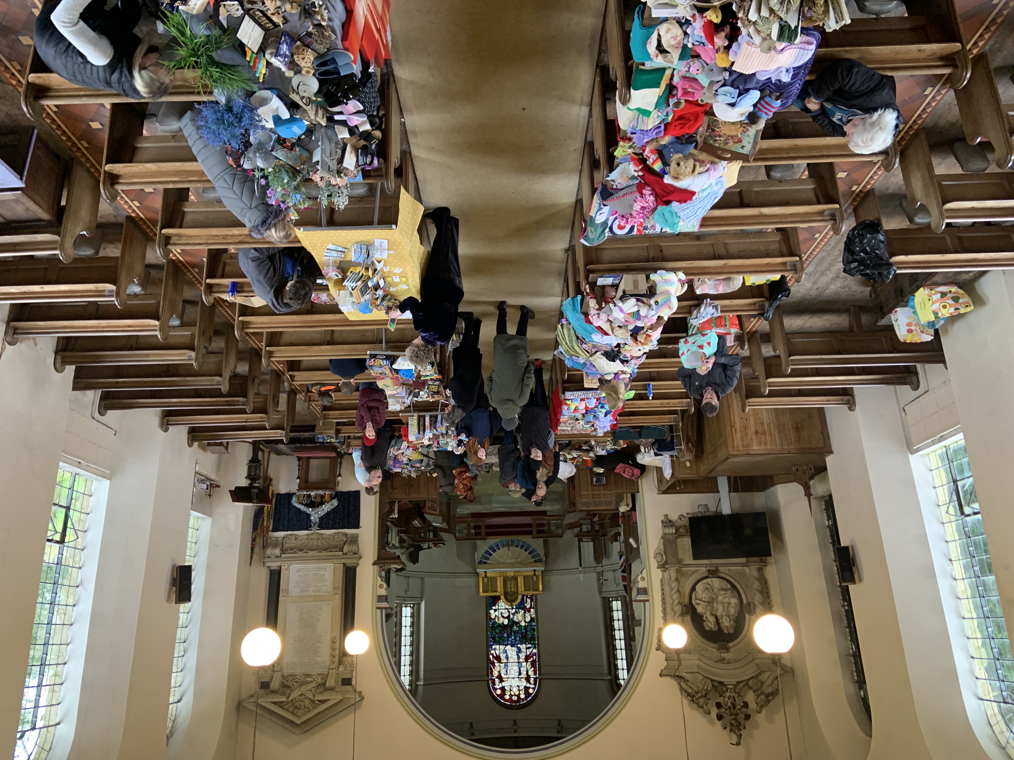 Tables full off things to sell laid across the pews at St Bartholomew's Church