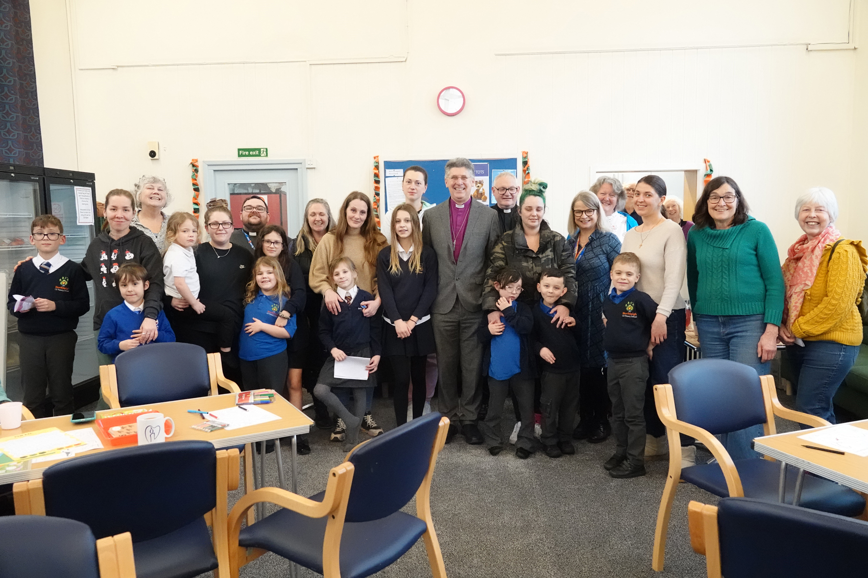 Bishop Martin stands with members of the Malvern Link after school club