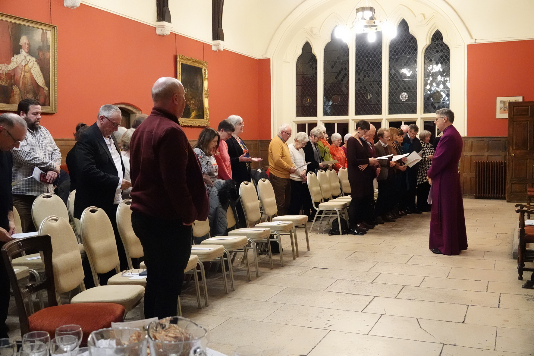 Bishop Martin addressing people receiving their Bishop's certificate