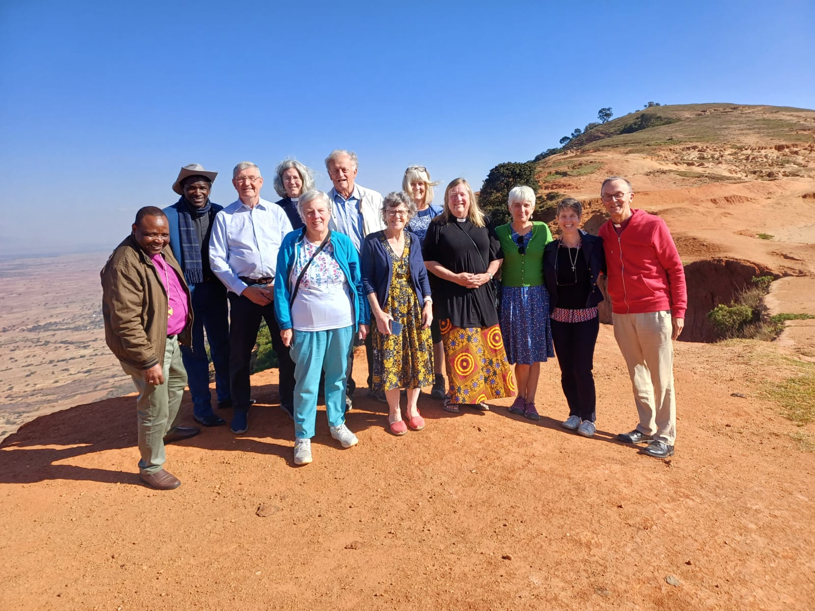 Members of the diocesan rip to Morogoro standing on a mountain