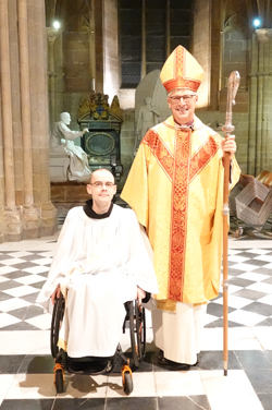 Brother Michael net to Bishop Martin inside the Cathedral