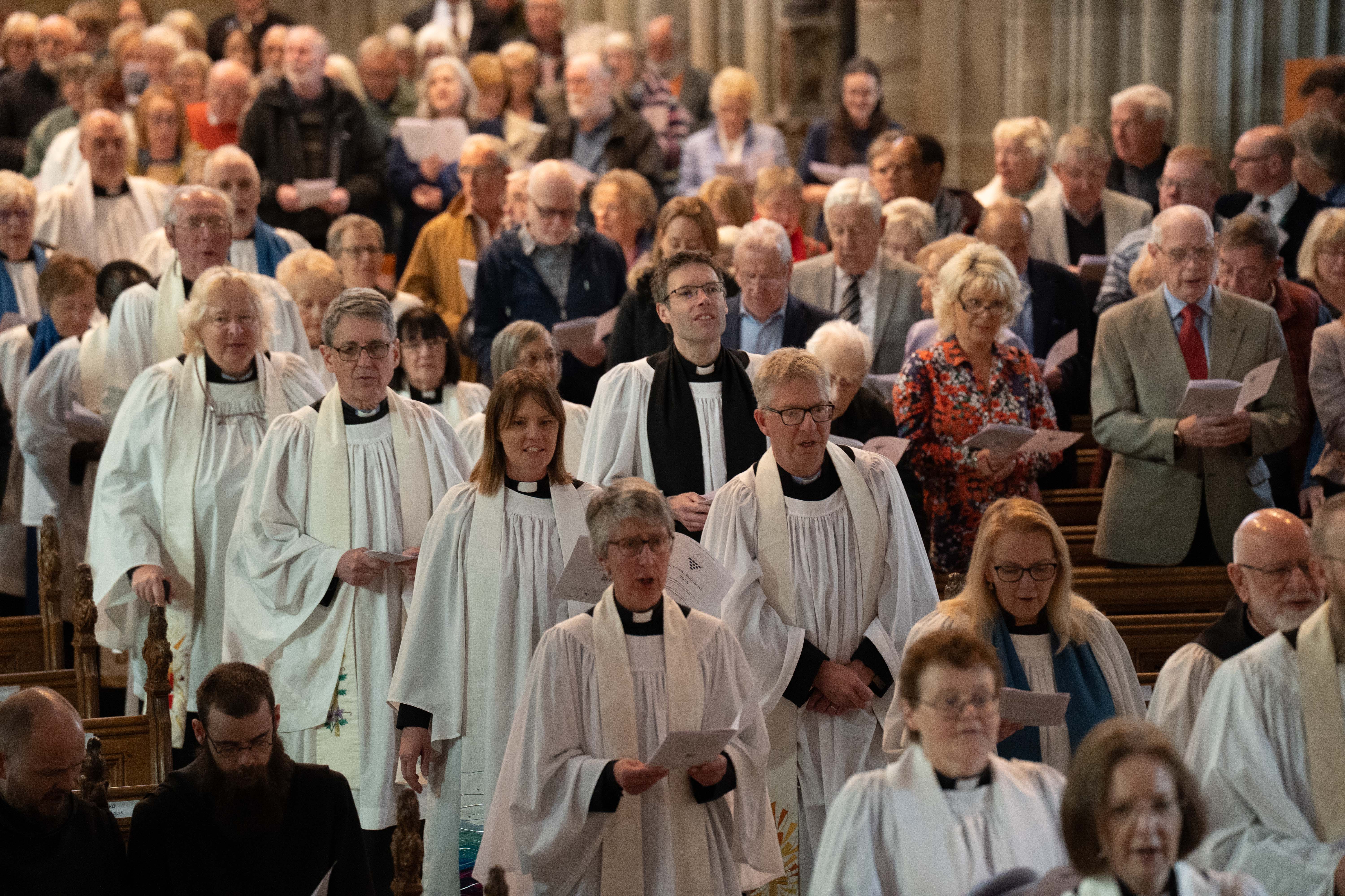 Clergy processing down the aisle at Worcester Cathedral