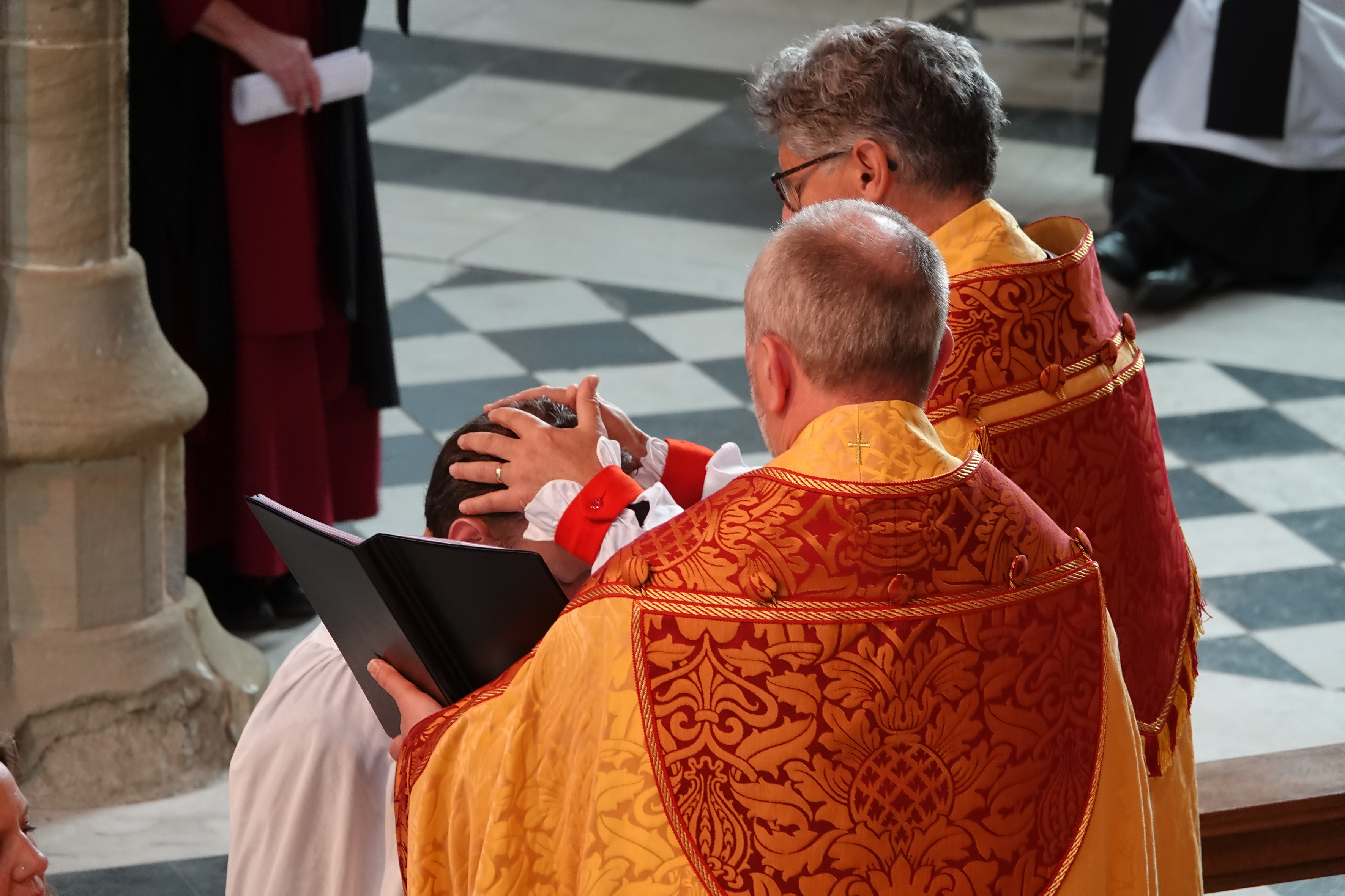 Bishop Martin ordaining a new Deacon