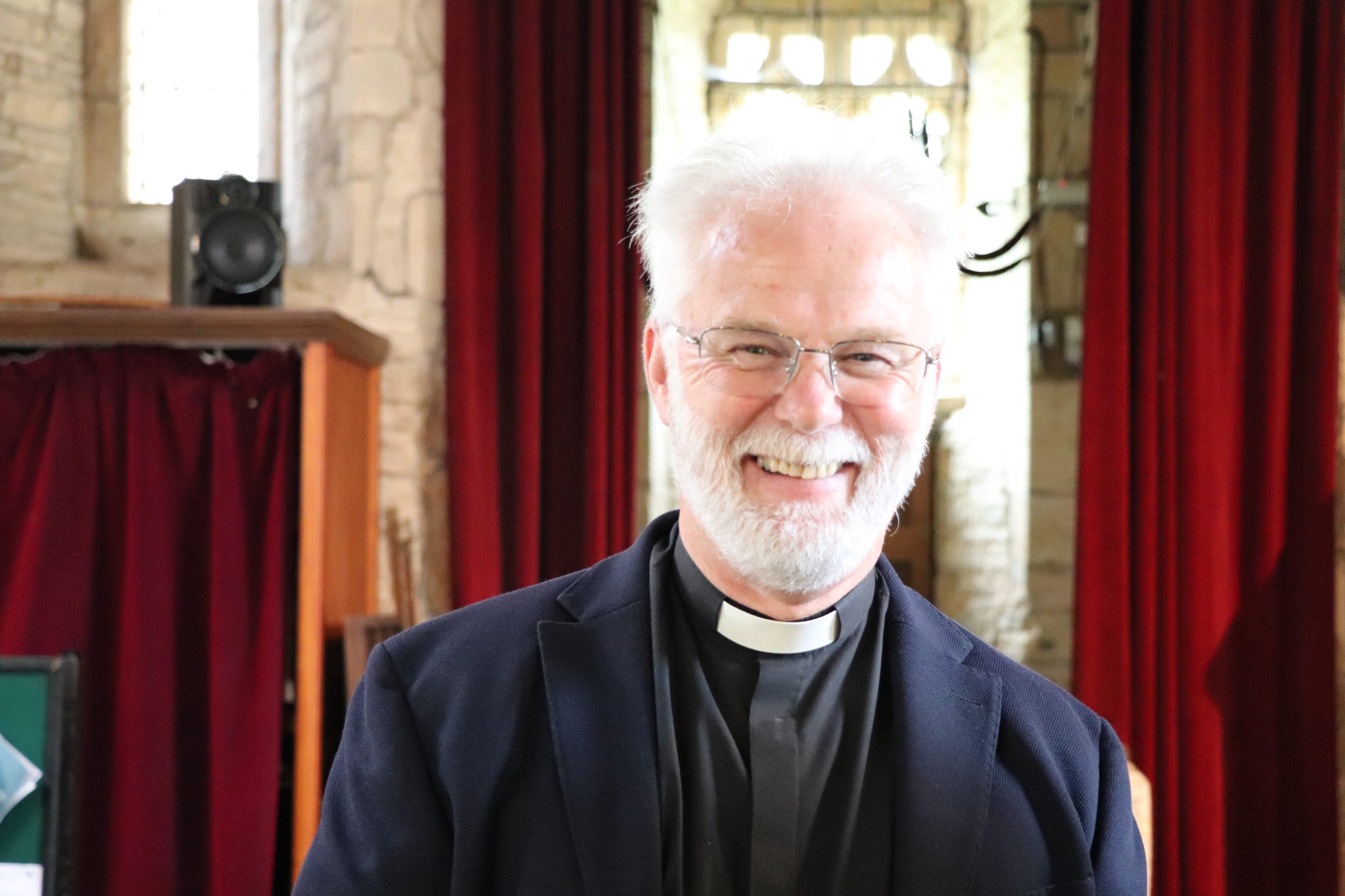 Head and shoulders photo of Richard Thorniley standing in church