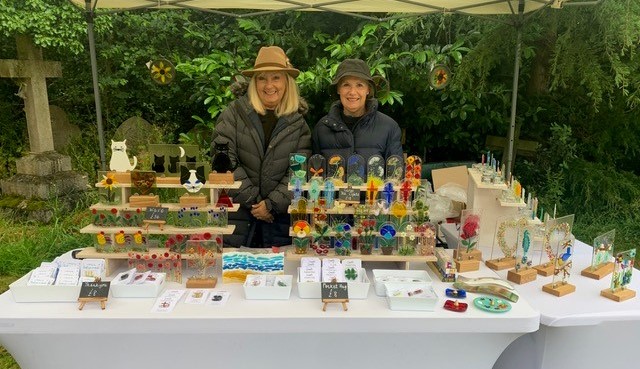 Local artists displaying their creations on a stall at Hallow church Arts and Crafts Fayre