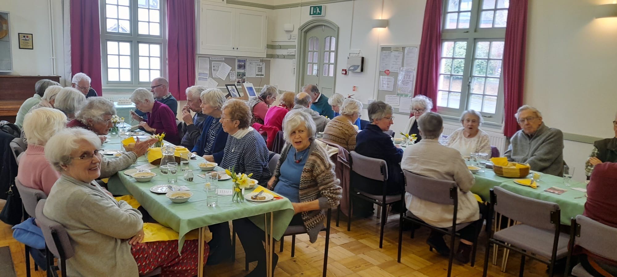 People sitting eating lunch in Wyre Piddle