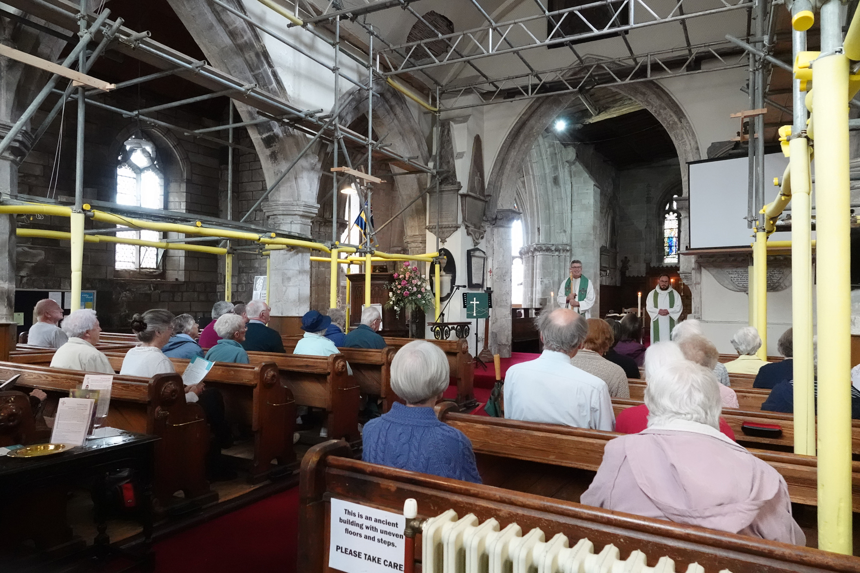 Congregation of St Andrew's Church Droitwich listening to Bishop Martin