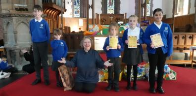 St Barnabas presentation of harvest certificates.jpg