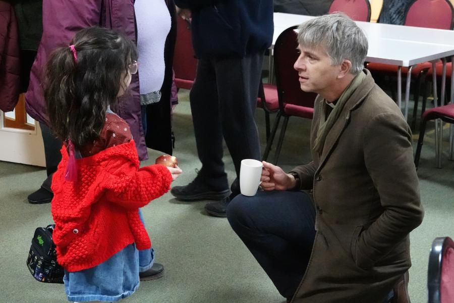 Bishop Hugh & young girl at St Stephen Redditch.jpg