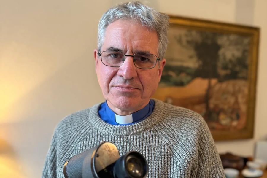 John Flitcroft with binoculars (Christian Aid).jpg