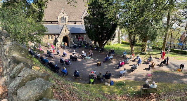 The congregation outside Holy Trinity Church in Malvern