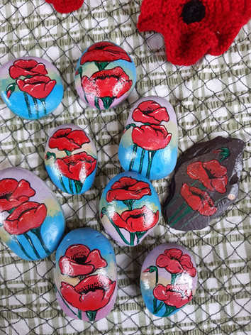 Rocks painted with poppies
