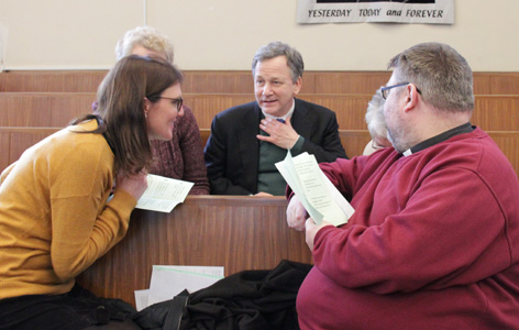 Group in church talking together