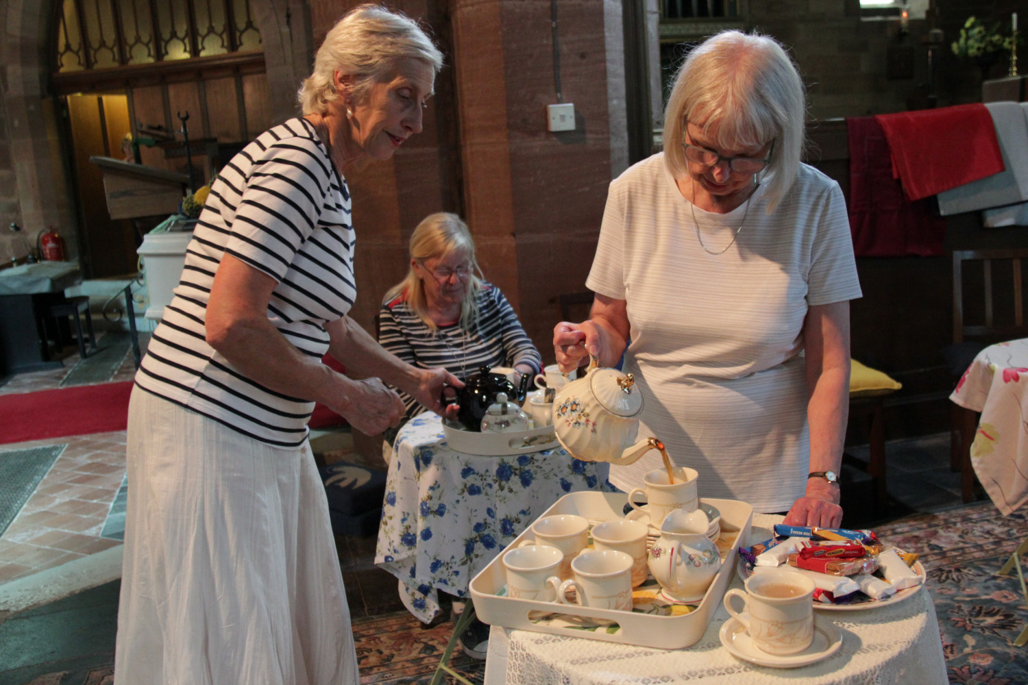 Pouring tea at Catshill connect