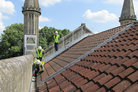 Maintenance team on the church roof