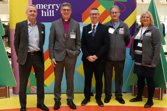 Bishop Martin with some of the team at Merry Hill