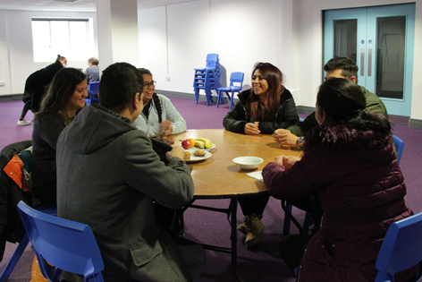 Refugees talking together