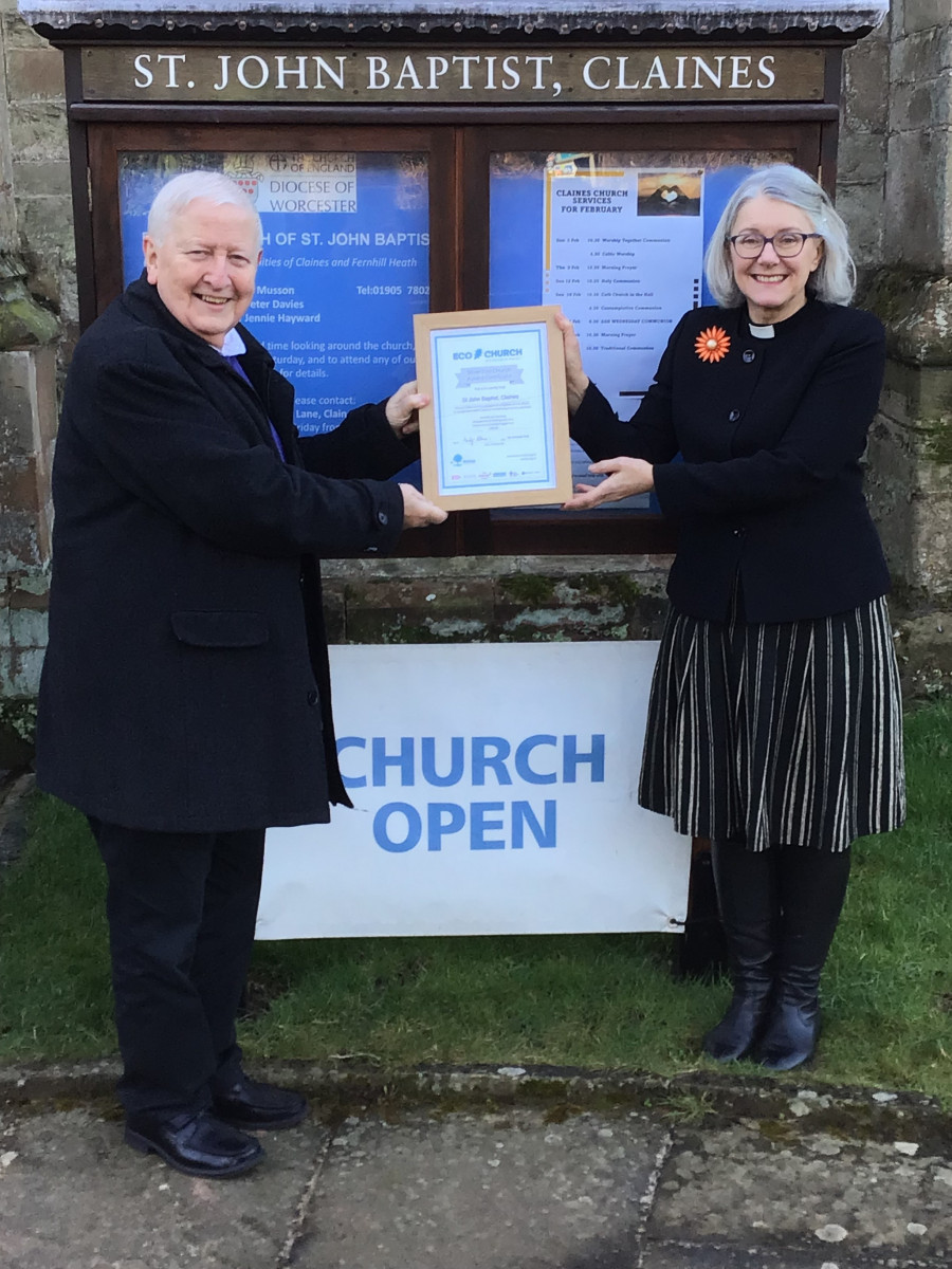 Claines church receiving their eco church certificate