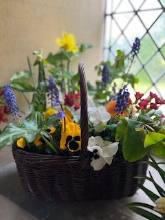 Sustainable flower arrangement in a basket
