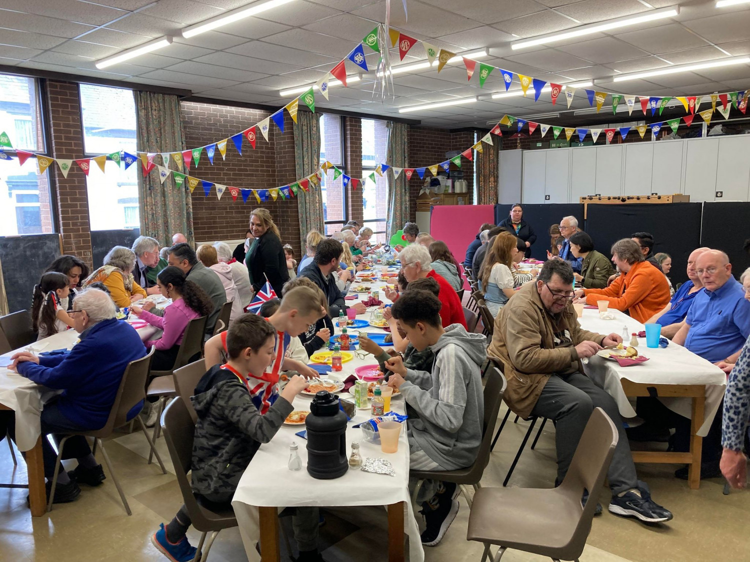 People enjoying a coronation lunch at Old Hill Church