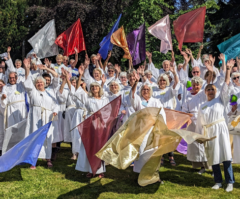 Volunteers at Lifepath dressed as monks and waving banners