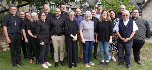 candidates for ordination standing in a group outside holland house